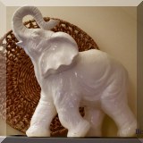 D09. One of a pair of pottery elephants. 